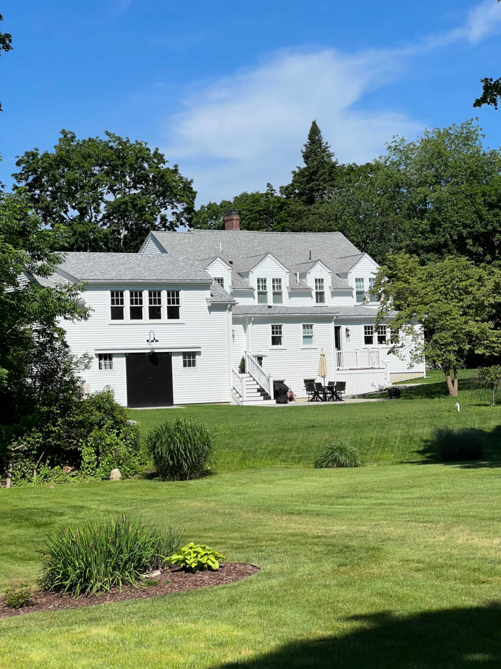 Siding contractor crew working on a Greater Boston home exterior